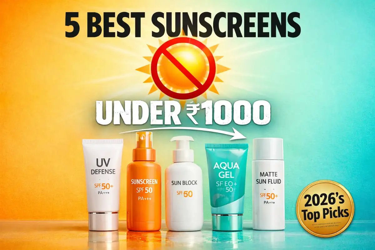 A wide horizontal product showcase banner for a skincare blog, dimensions 1200x628. Split background: left side is a bright sunny yellow-orange gradient, right side is a cool mint green-blue gradient. In the center, five modern sunscreen product bottles lined up in a row, photorealistic style, looking premium and glossy. Above the products, a large glowing sun icon with a red "prohibited" (circle with slash) symbol over it floating in the air. Bold typography in the foreground: Main text "5 BEST SUNSCREENS" in huge black bold font at the top center. Below it, in a large stencil style, "UNDER ₹1000" in white with a slight shadow. At the bottom right, a circular gold badge that says "2026's Top Picks". A subtle arrow graphic pointing from the text towards the products. High contrast, vibrant colors, magazine quality, 4k, sharp focus, commercial product photography style.